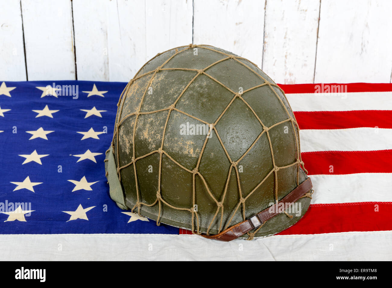 wwii military helmet on american flag Stock Photo - Alamy