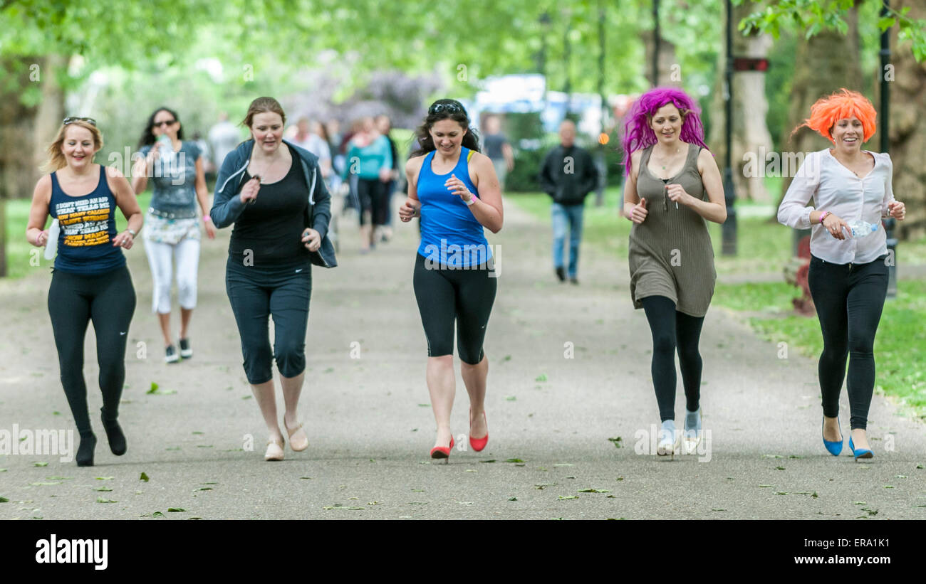 London, UK. 30 May 2015. Runners during the Hope in Heels charity race