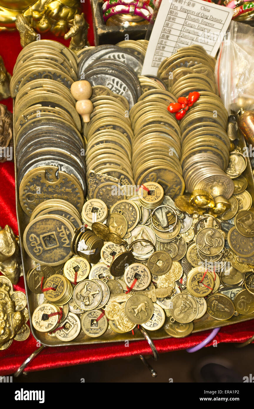 dh Temple street YAU MA TEI HONG KONG Chinese lucky old ancient coins street market stall good luck money fortune coin silver Stock Photo