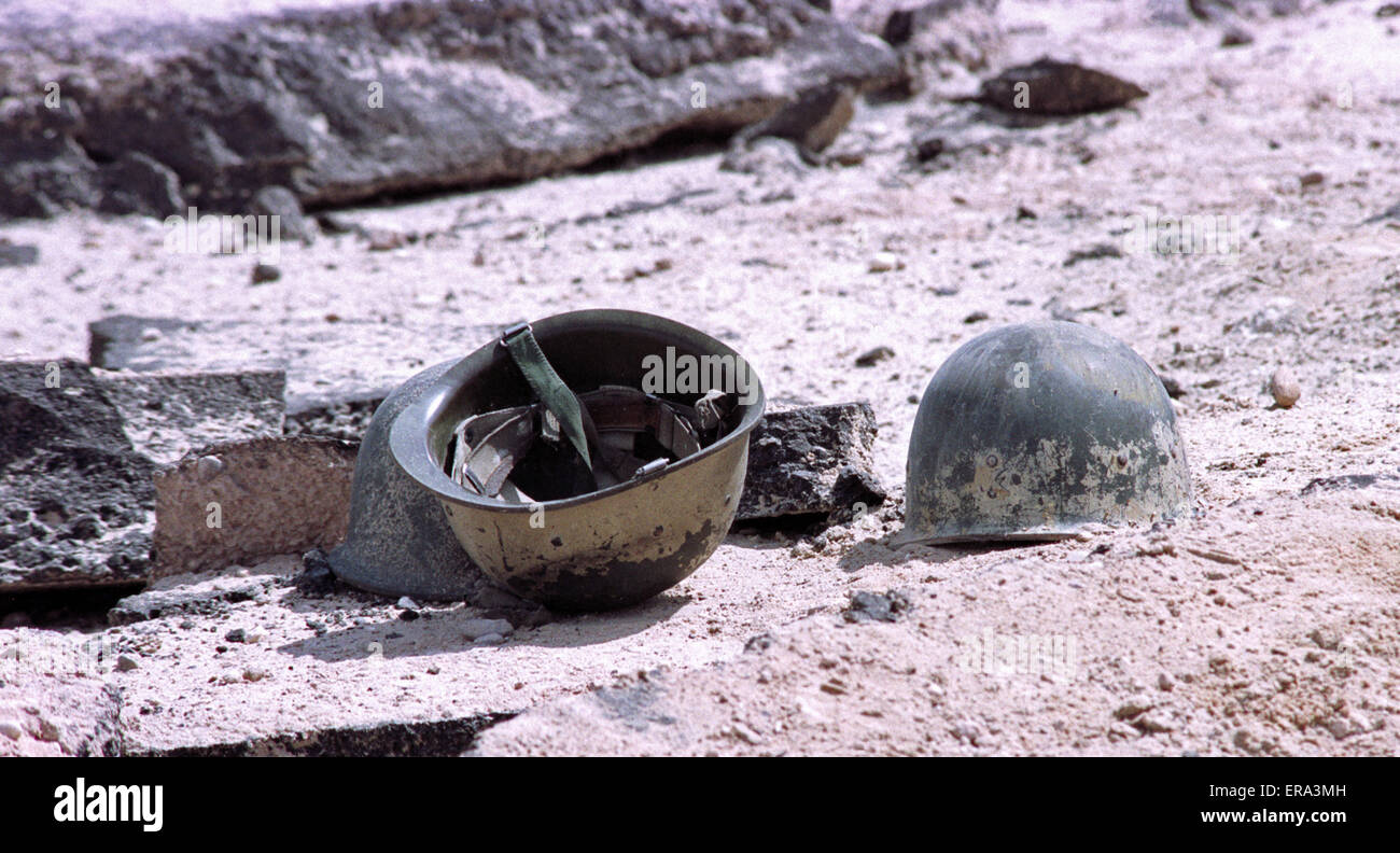 5th March 1991 Disgarded Iraqi soldiers’ helmets in the desert, next to Route 801, the road to