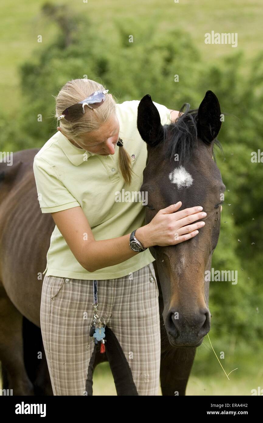 woman and warm-blood Stock Photo