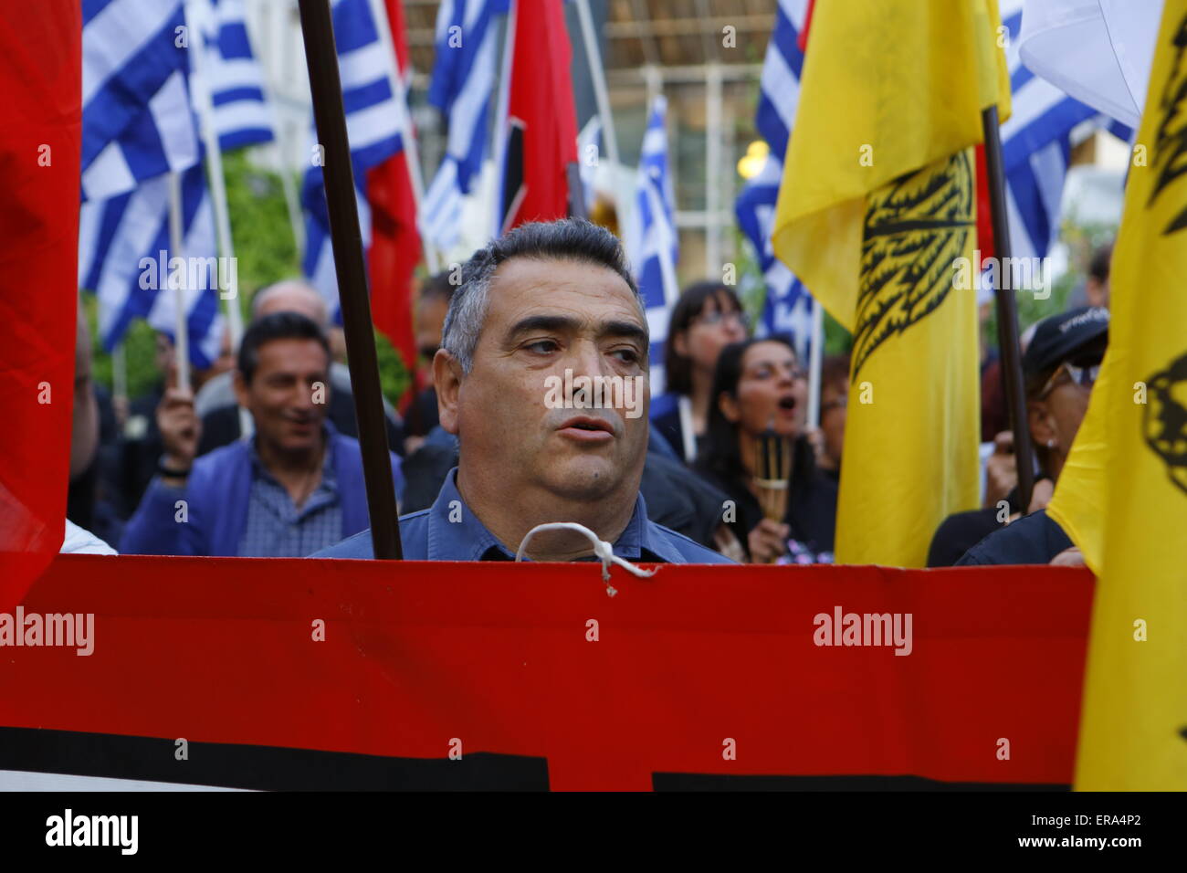 Athens, Greece. 29th May, 2015. Golden Dawn sympathizers listen to the speeches and shout slogans. Right-wing party Golden Dawn held a rally in Athens, remembering the fall of Constantinople and the death of the last Byzantine Emperor Constantine XI Palaiologos in 1453. His legend state that he will re-conquer Constantinople for Christianity. © Michael Debets/Pacific Press/Alamy Live News Stock Photo
