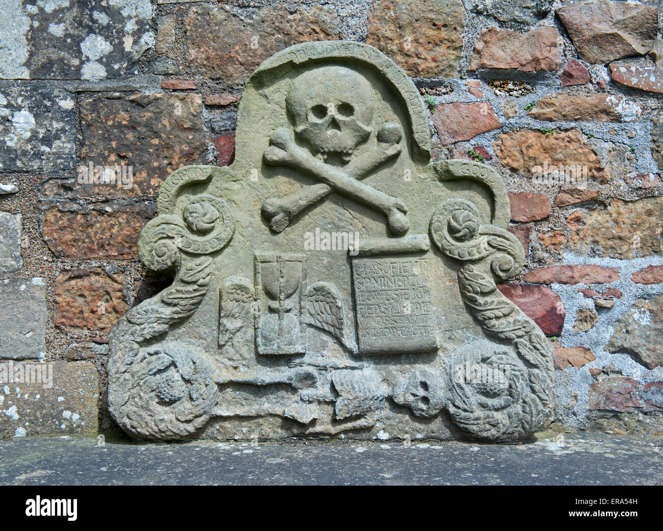 Skull and crossbones on memorial, in churchyard, UK Stock Photo Alamy