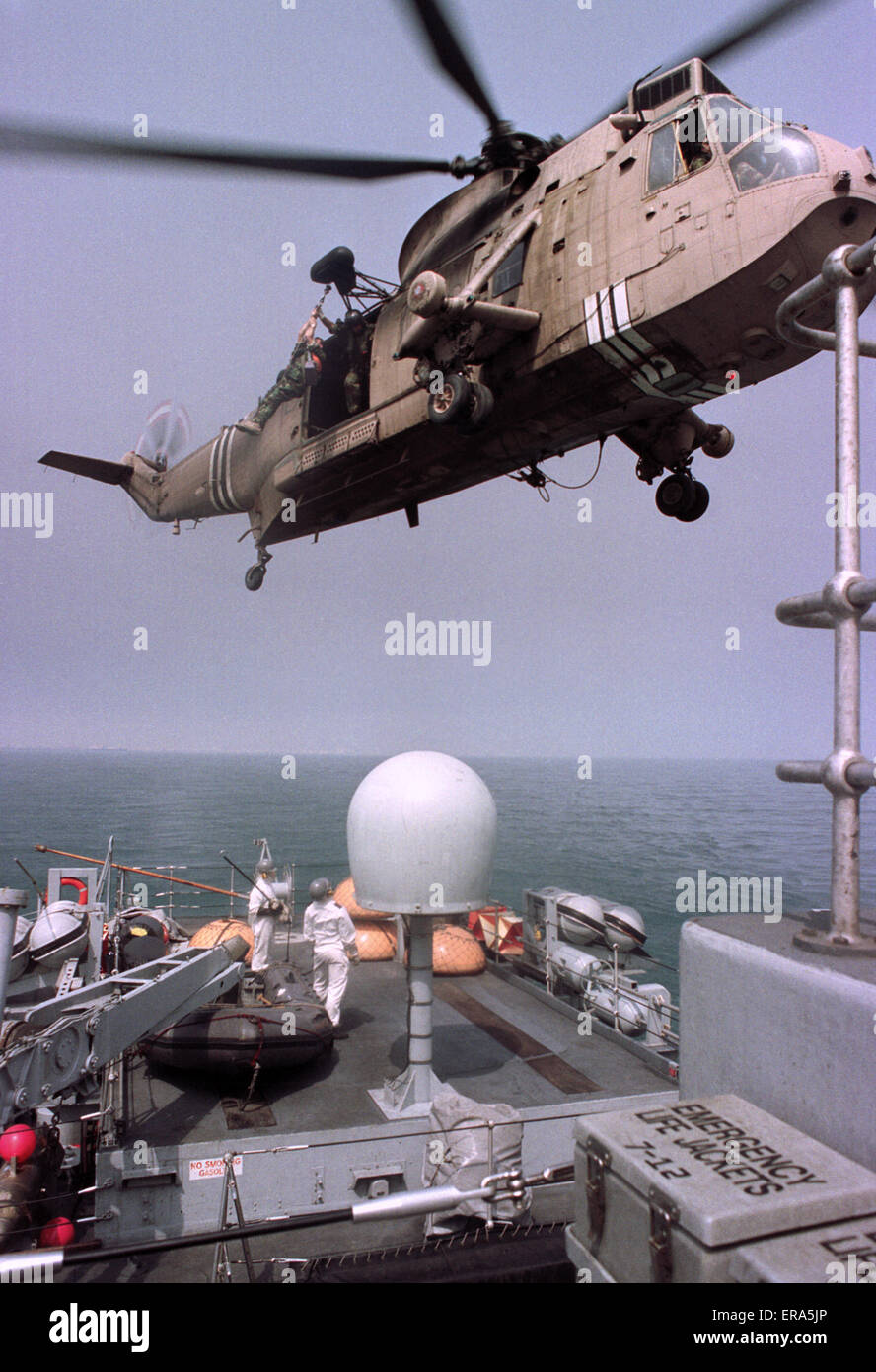 20th March 1991 An RAF Sea King helicopter lowers a crew member to the