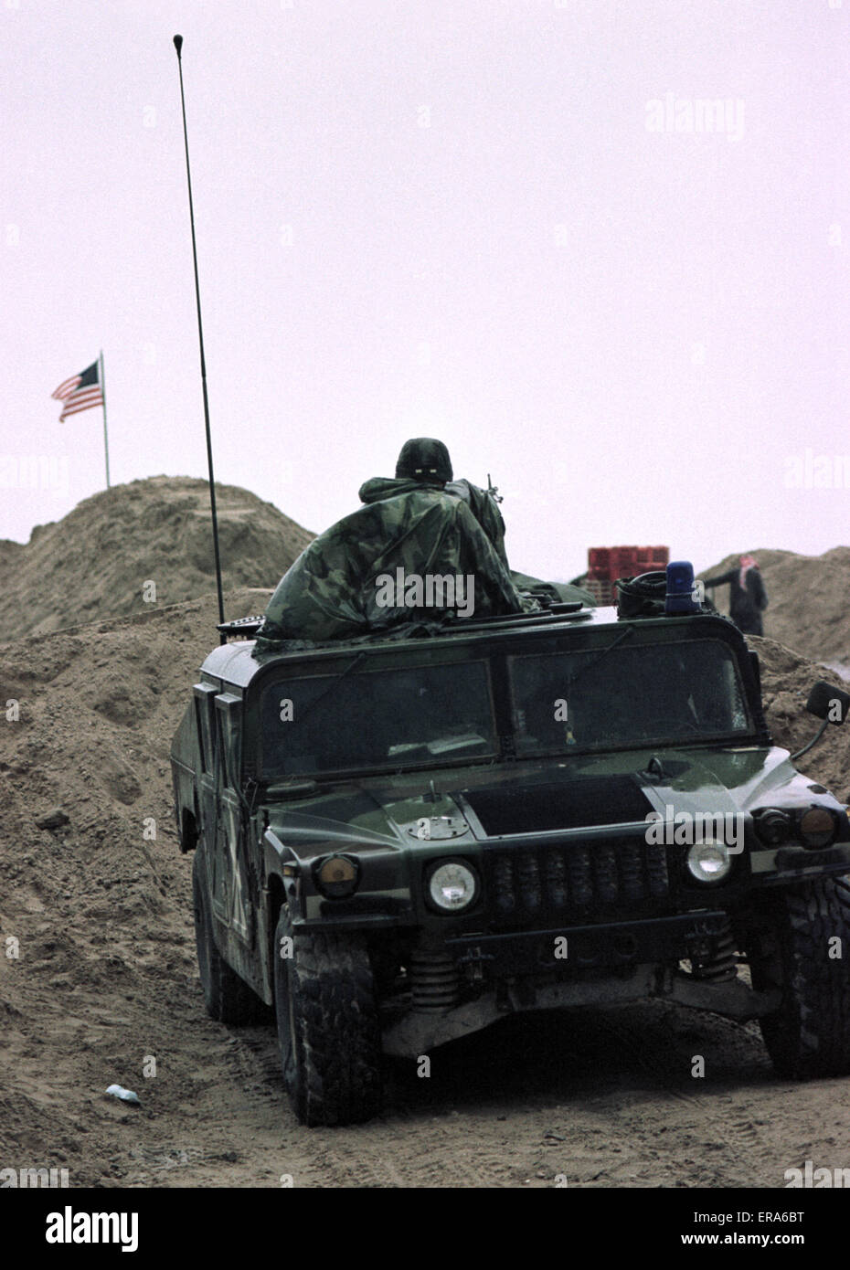 23rd March 1991 A wet afternoon at Checkpoint Charlie, the limit of U.S. Army occupation along the Basra Road in southern Iraq. Stock Photo