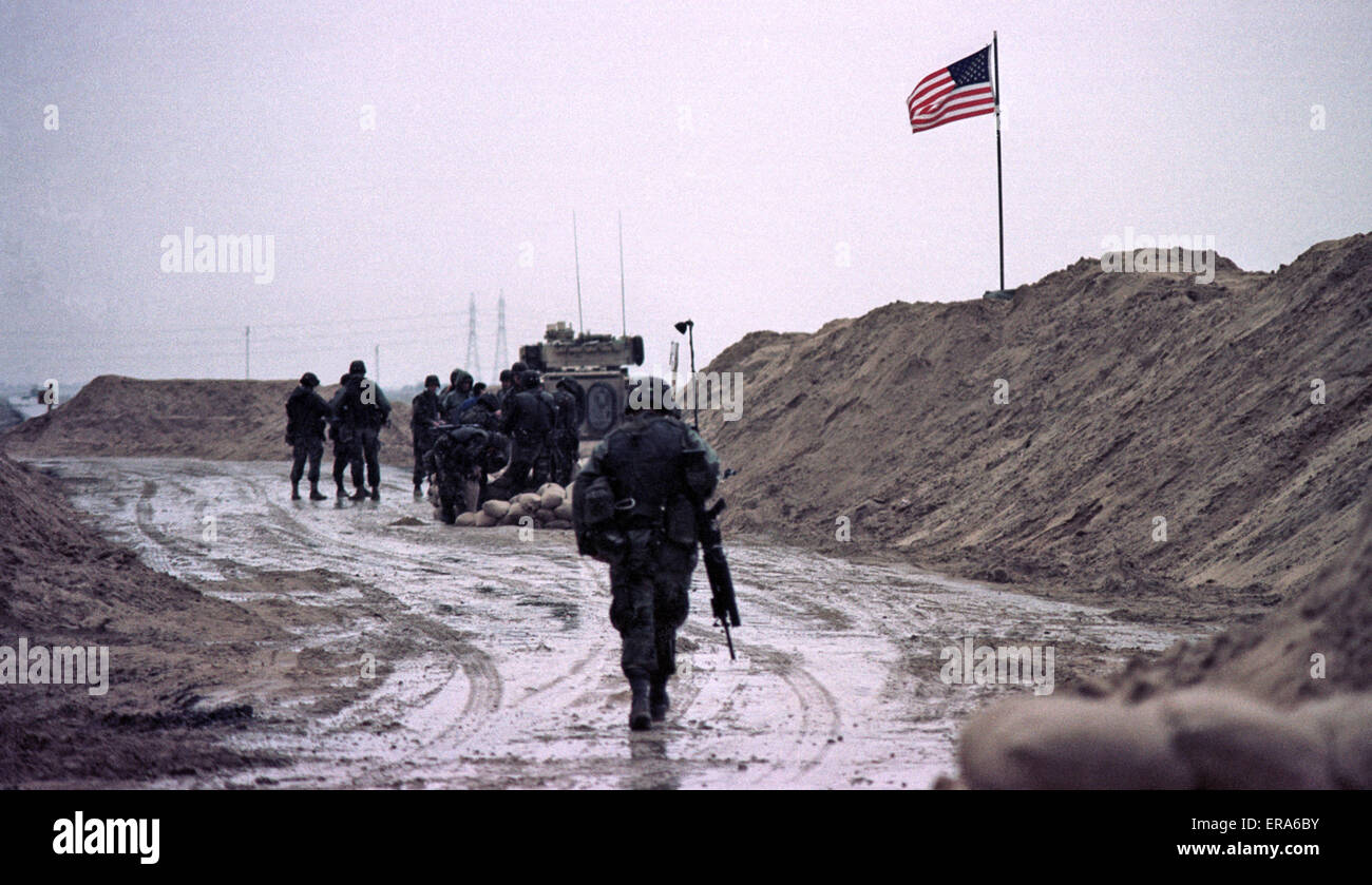 23rd March 1991 A wet afternoon at Checkpoint Charlie, the limit of U.S. Army occupation along the Basra Road in southern Iraq. Stock Photo