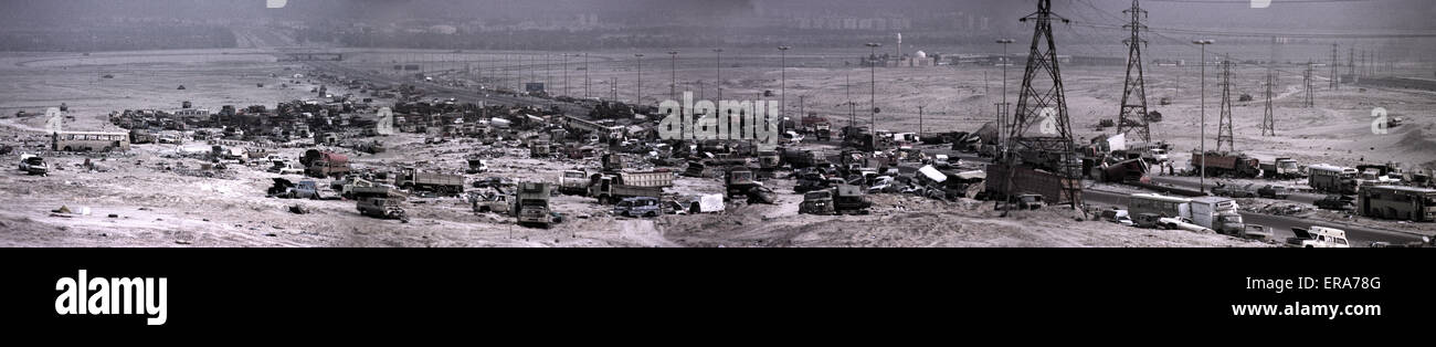 1st April 1991 A panorama of wrecked Iraqi Army vehicles along the “Highway of Death” on the Basra Road, north of Kuwait City. Stock Photo