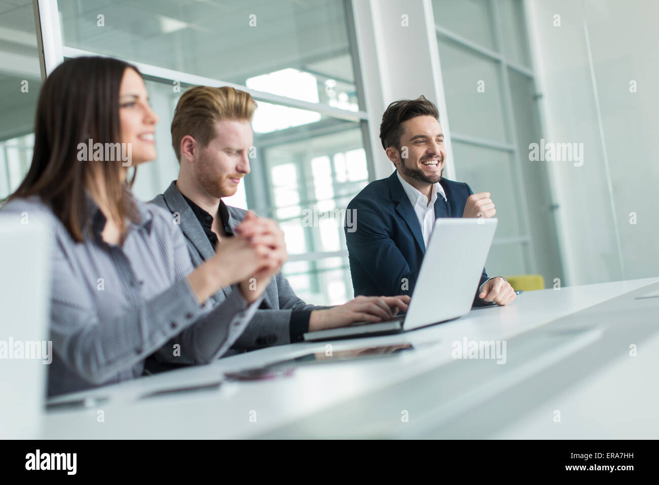 Young people in the office Stock Photo - Alamy