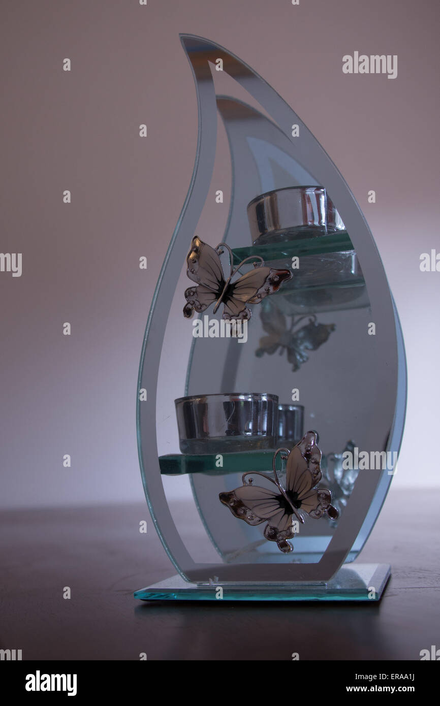 Glass candle holder with butterflies Stock Photo Alamy