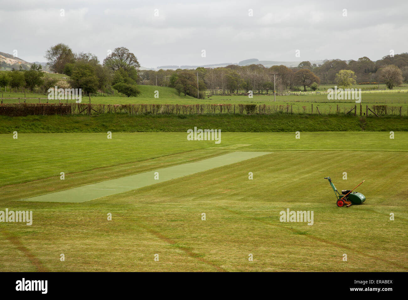 Threlkeld Cricket Club wicket with lawnmower Stock Photo