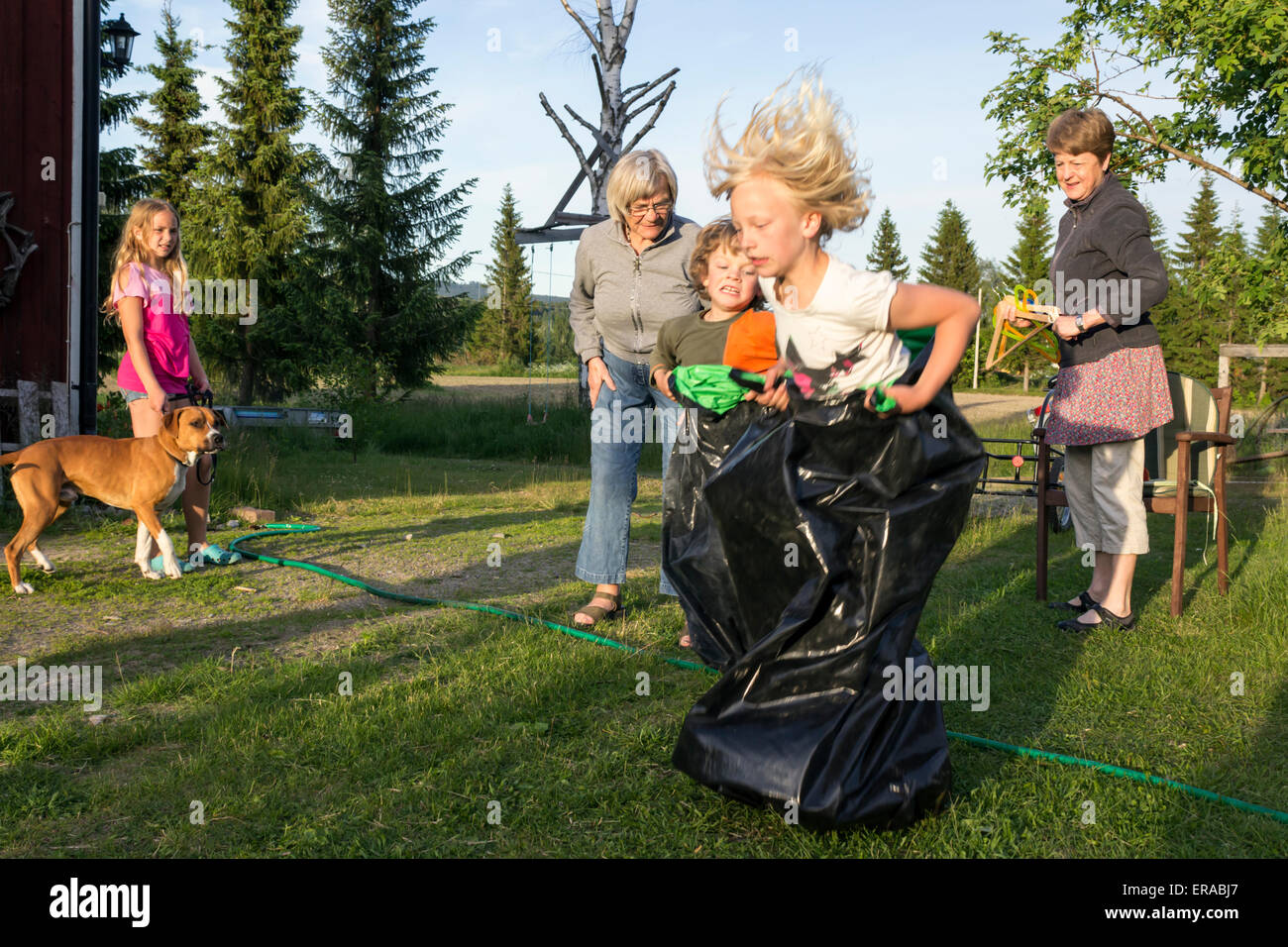 Swedish Family at Mid Summer Holiday Stock Photo