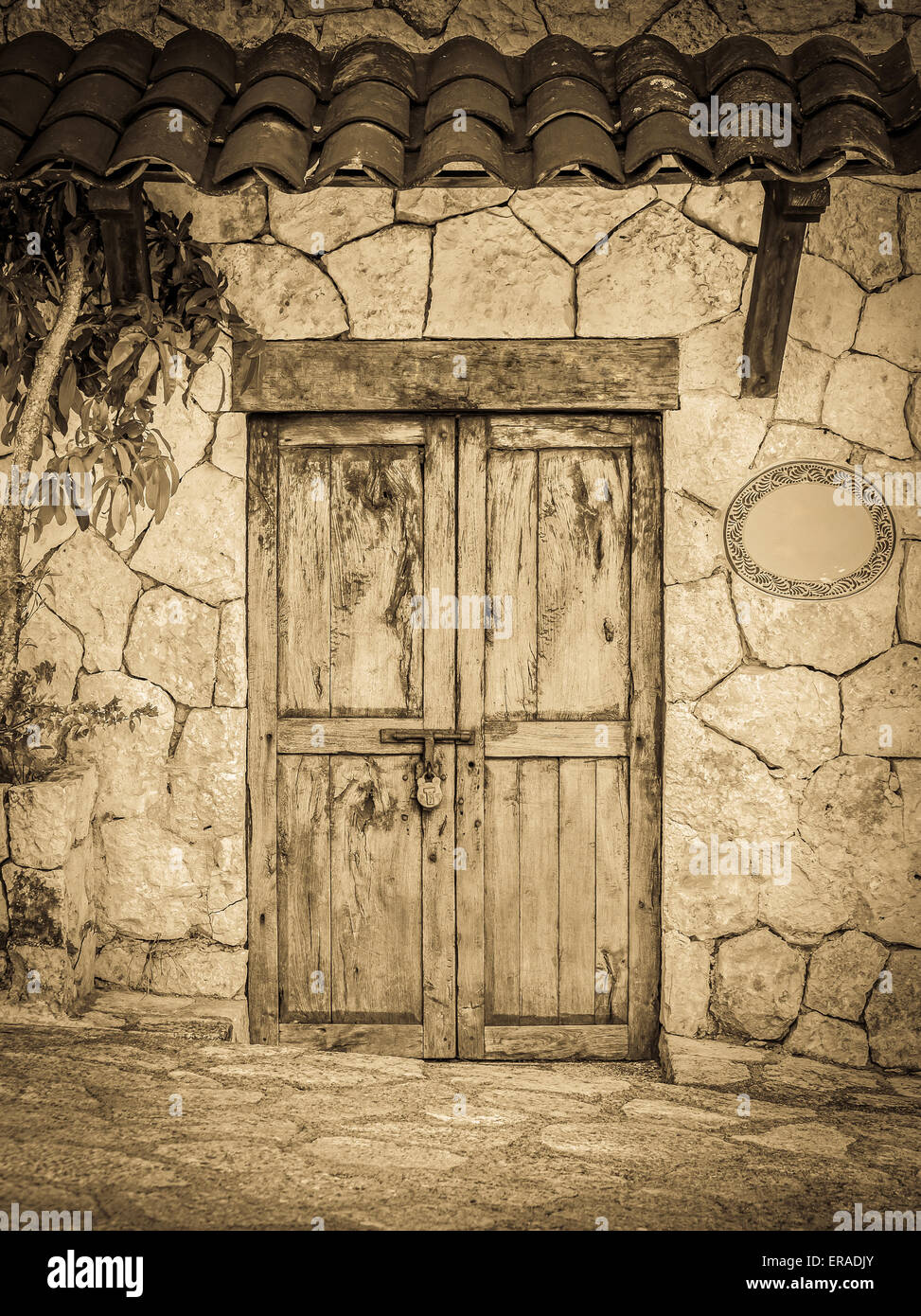 Vintage style old locked colonial doors of mexican hacienda Stock Photo