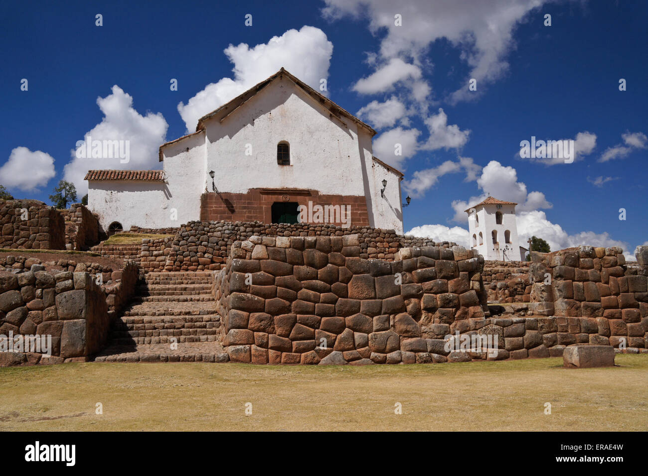 Old colonial church with Inca stonework, Chinchero, Peru Stock Photo