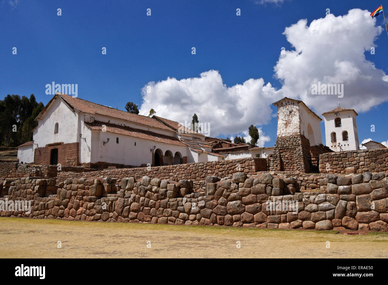 Old colonial church with Inca stonework, Chinchero, Peru Stock Photo