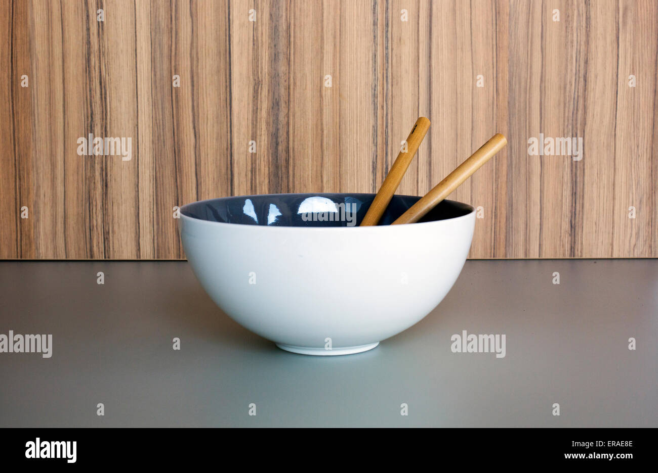 white bowl with wooden spoons on kichen counter Stock Photo Alamy