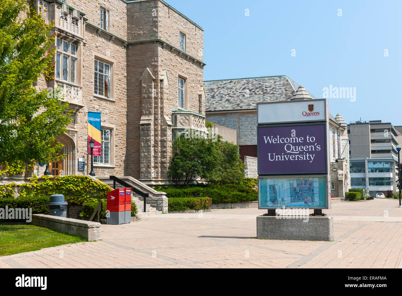 KINGSTON, CANADA - AUGUST 2, 2014: Welcome sign on Queen's university campus next to Students Memorial Union building in Kingsto Stock Photo