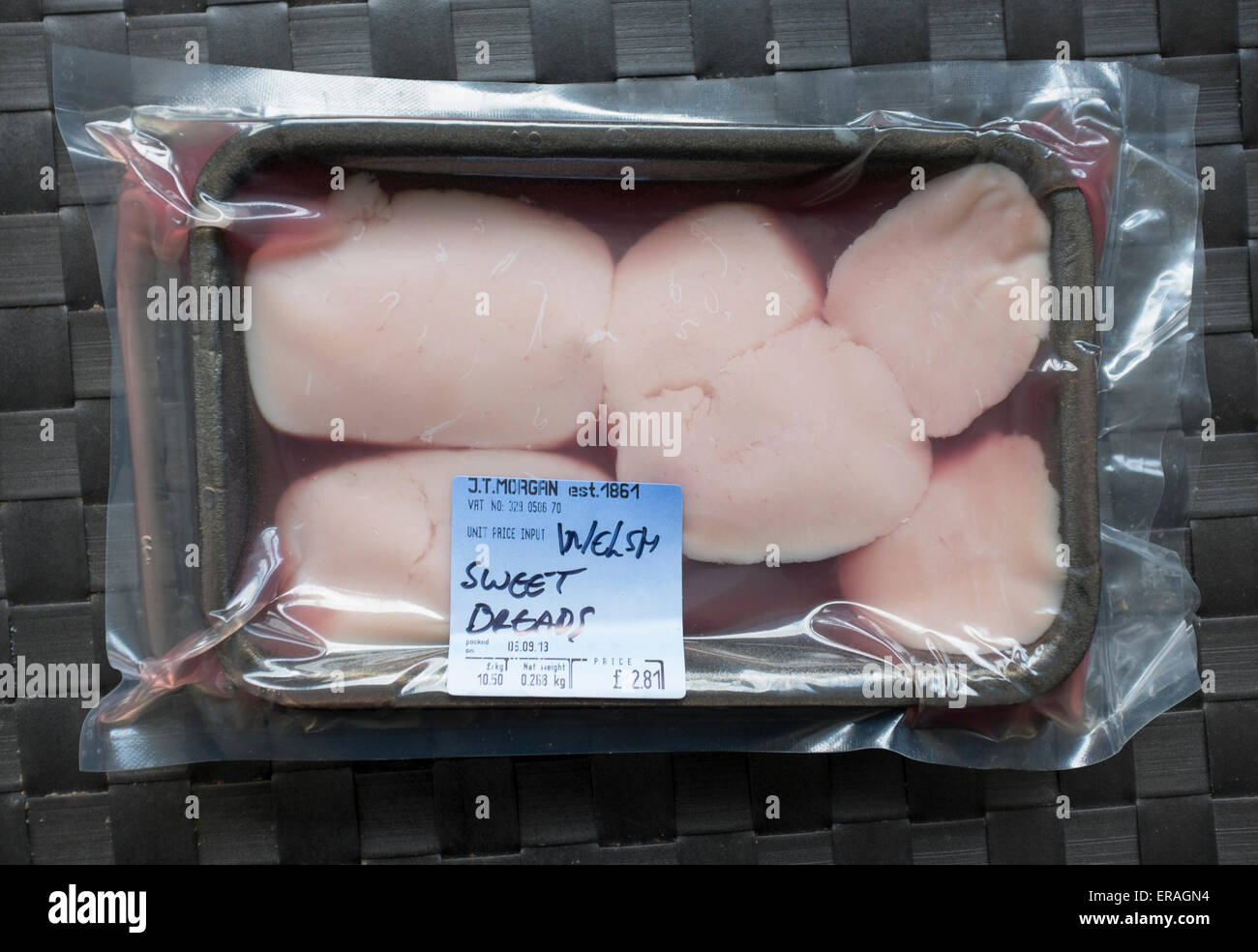 Sweet Breads on sale at Cardiff market - An example of the strange or weird food eaten by people around the world Stock Photo