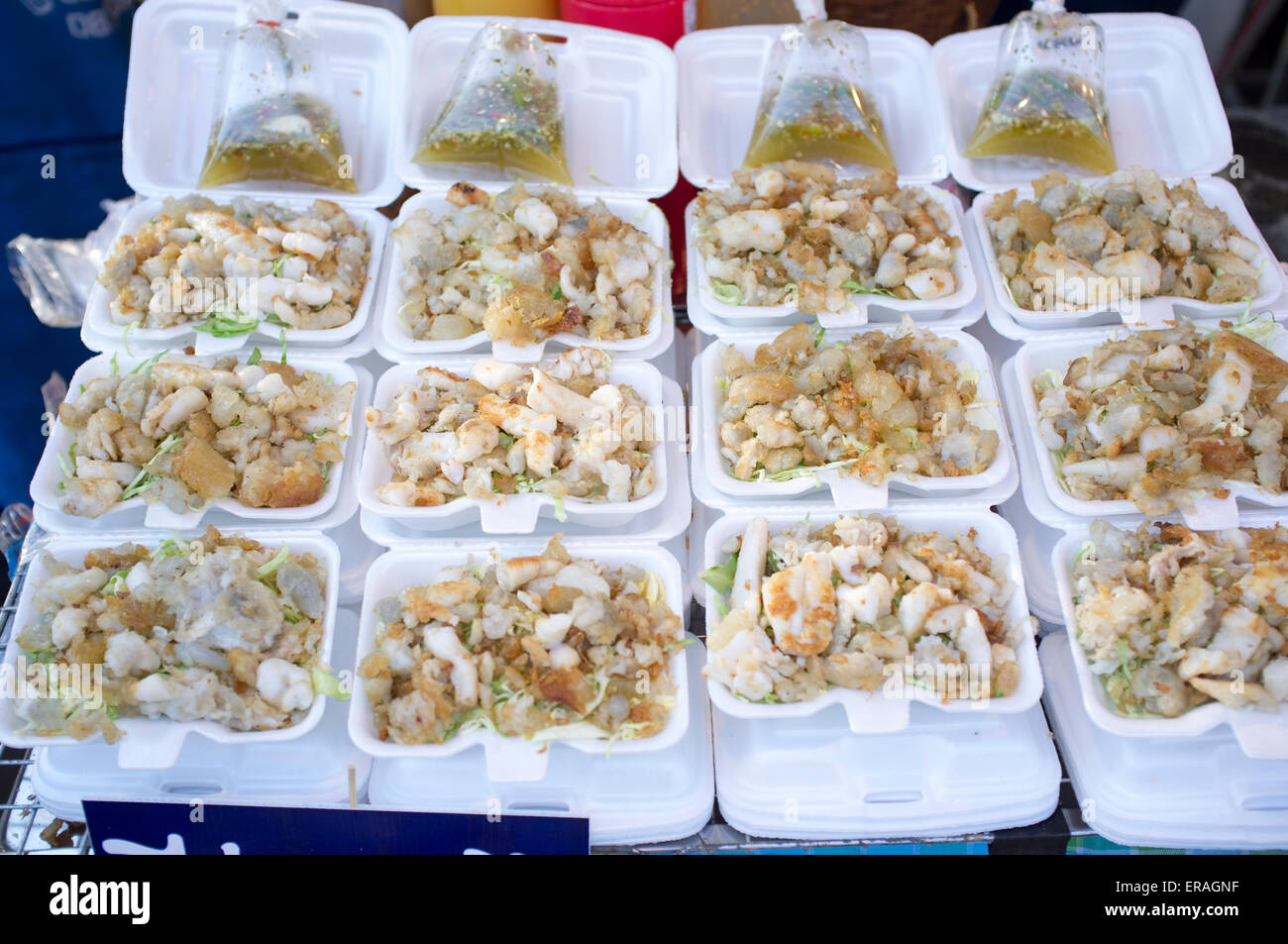 Fried Squid eggs on sale at Chatuchak Market in Bangkok Thailand Stock Photo