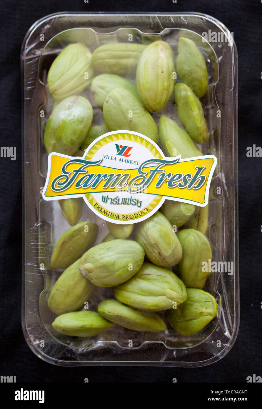 Stink Beans on sale in Thai Supermarket Stock Photo