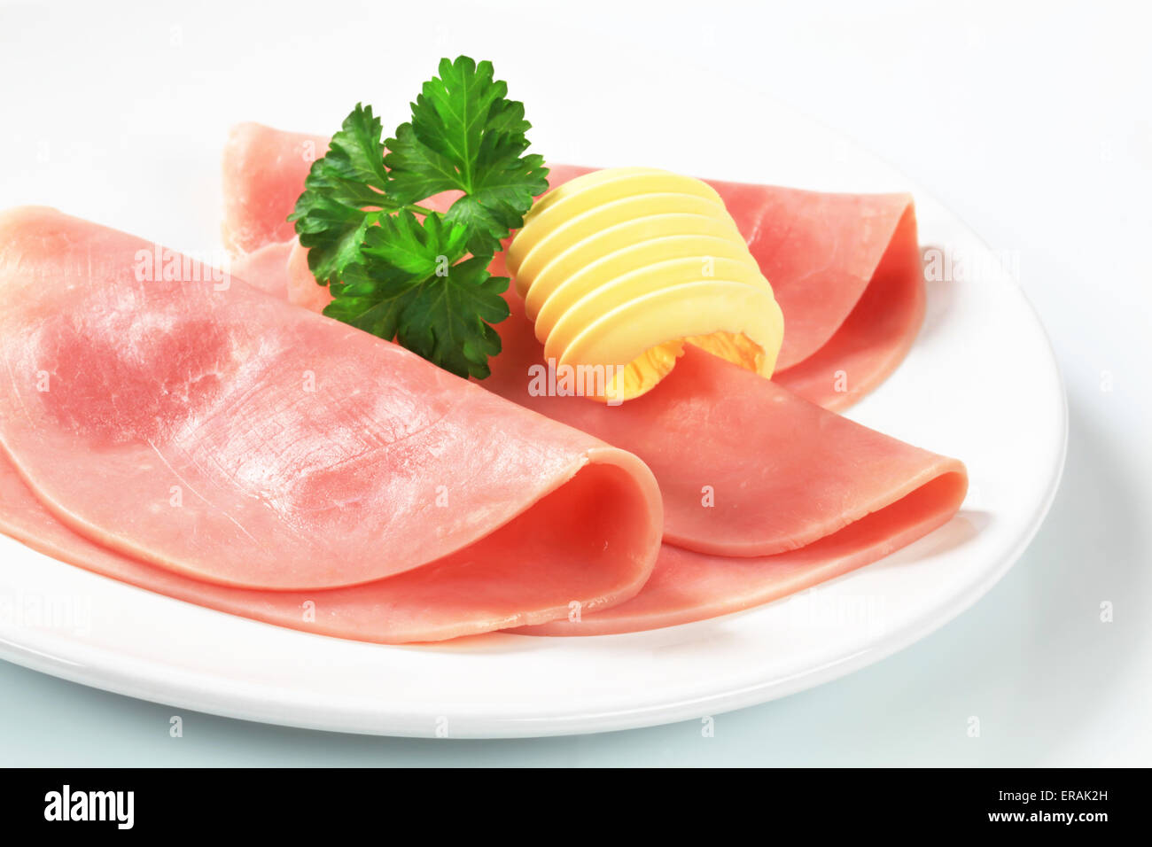Thin slices of fresh ham Stock Photo