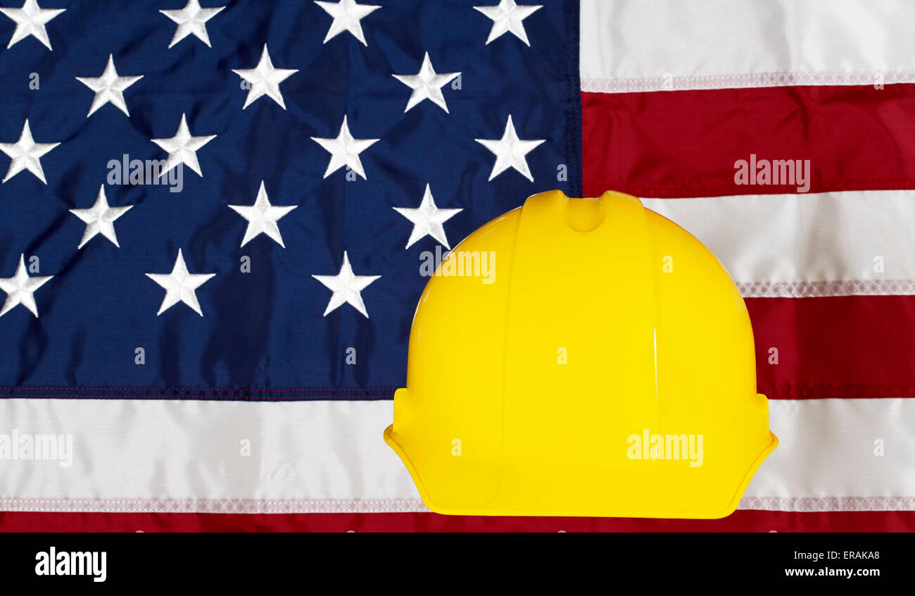 Construcion Industry Helmet on American Made Flag Stock Photo