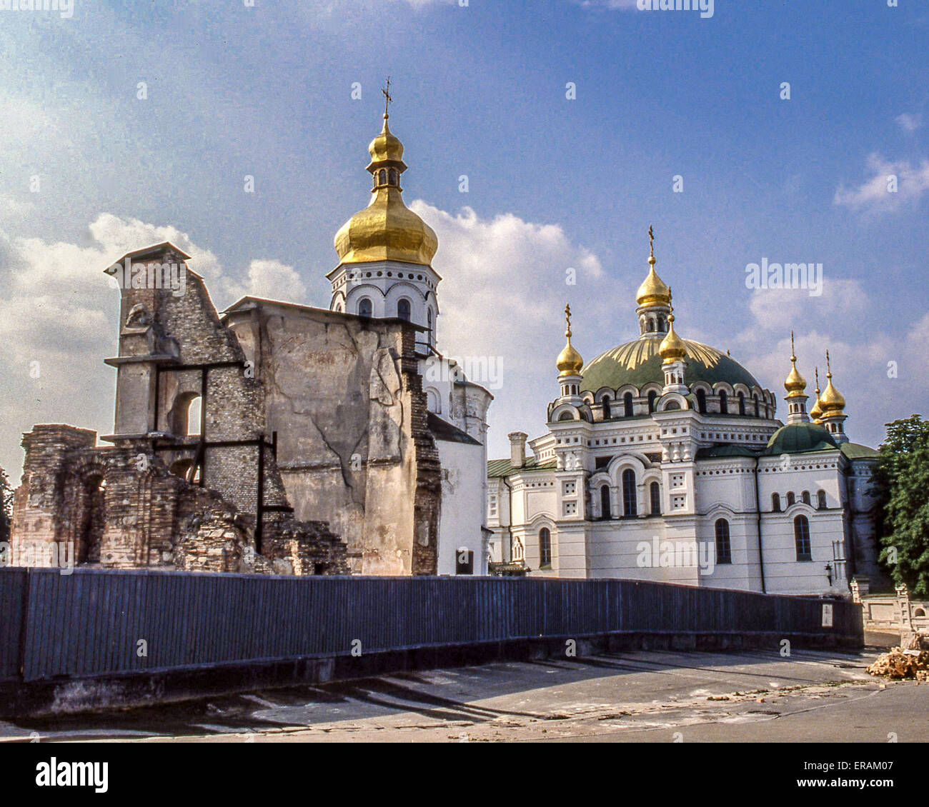 June 13, 1989 - Kiev, Ukraine - The ruins of the original Dormition Cathedral, Pechersk Lavras oldest edifice dating to the 11th century, almost completely destroyed in WW II (since restored and rebuilt). At right is the Refectory Church of Saint Anthony and Theodosius and adjoining refectory where monks had their meals. Founded in 1051, on the hills of the right bank of the Dnieper River, in Kiev, Ukraine, and also known as the Kiev Monastery of the Caves, Pechersk Lavra is the preeminent center of Eastern Orthodox Christianity and part of a UNESCO World Heritage Site that attracts pilgrims a Stock Photo