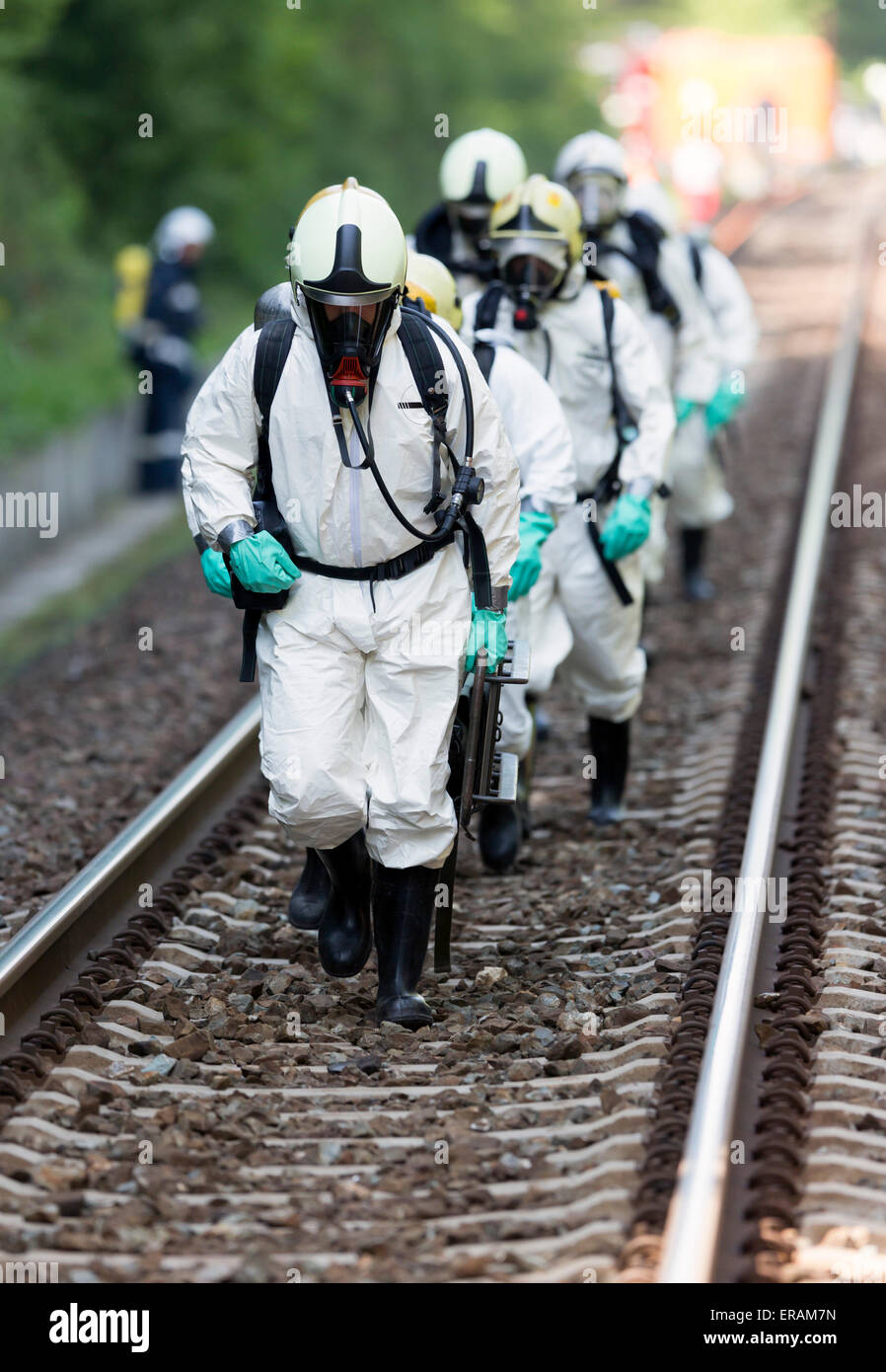 A team working with toxic acids and chemicals is approaching a chemical cargo train crash near Sofia. Teams from Fire department Stock Photo