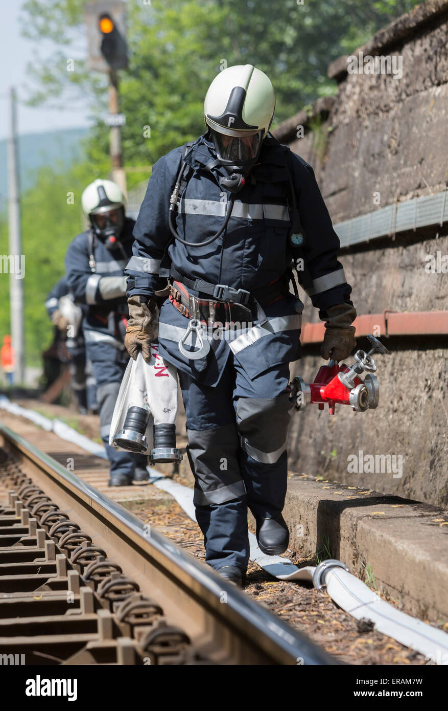 Firefighters are approaching a chemical cargo train crash near Sofia, Bulgaria. Teams from Fire department are participating in  Stock Photo