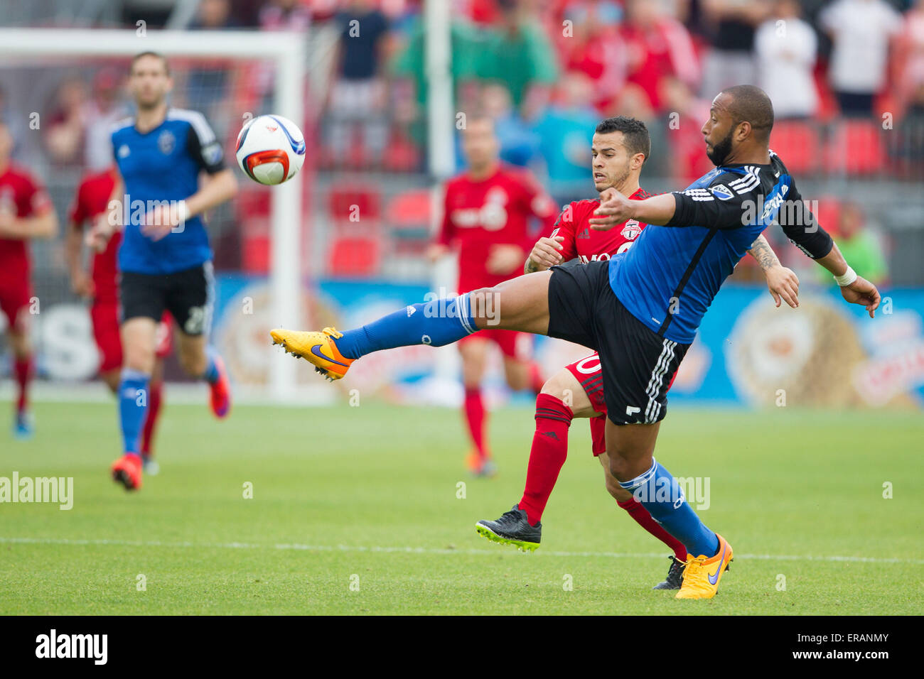 Toronto, Ontario, Canada. 30th May, 2015. Victor Bernardez (5) of the Earthquakes clears the ball during a MLS game between the Toronto FC and San Jose Earthquakes at BMO field in Toronto, ON. Credit:  csm/Alamy Live News Stock Photo