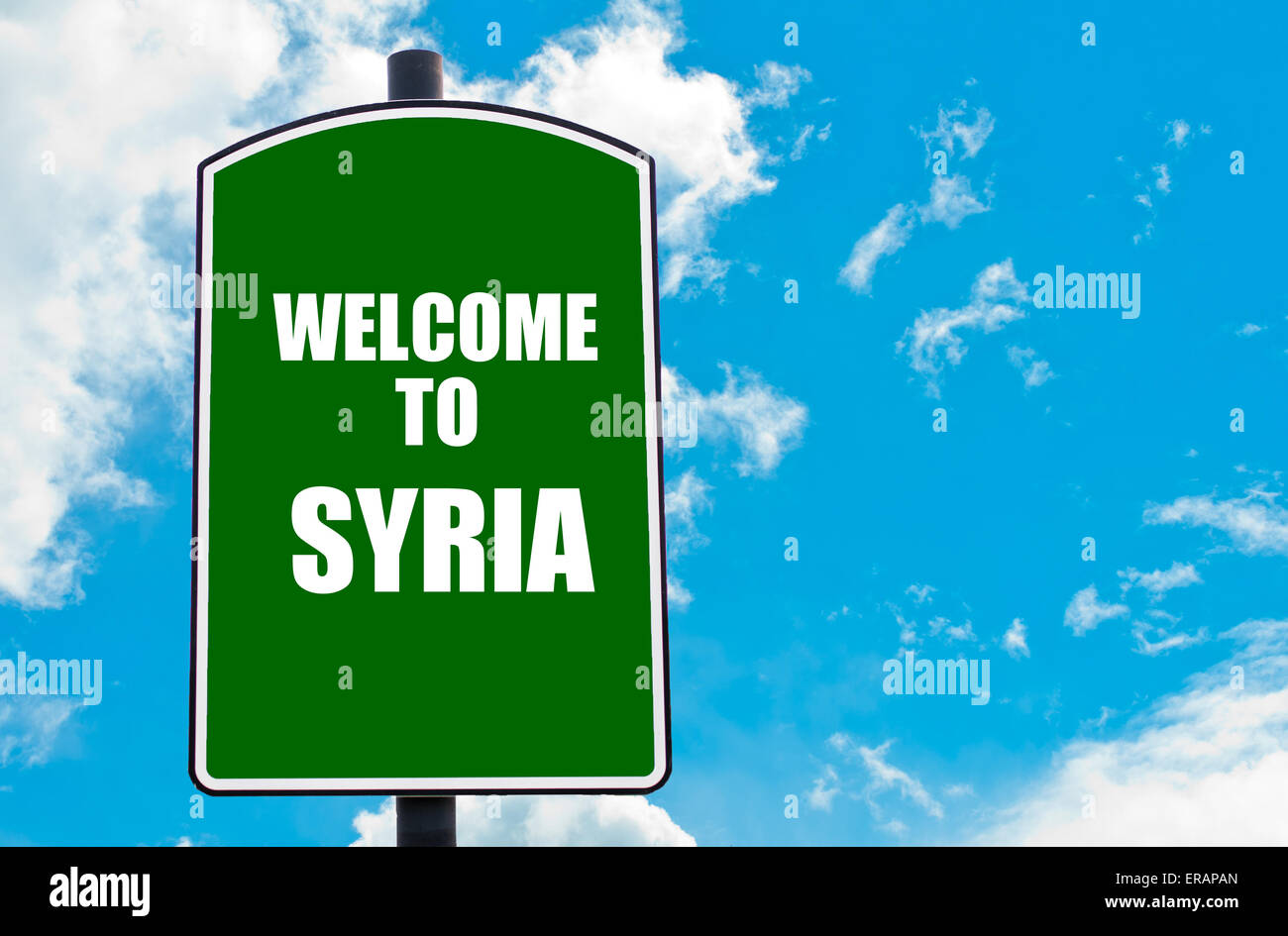 Green road sign with greeting message WELCOME TO SYRIA isolated over ...