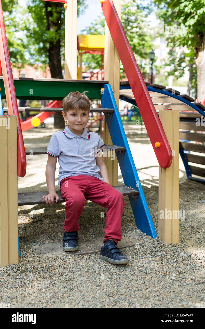 Cheerful little boy on playground hi-res stock photography and images ...