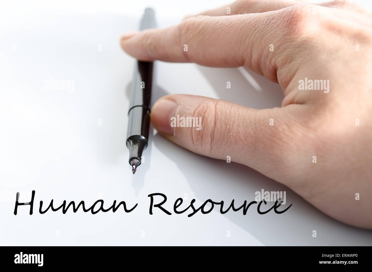 Pen in the hand isolated over white background Human resource concept Stock Photo