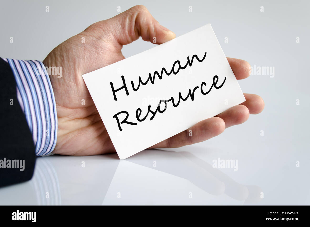 Business man hand writing Human resource Stock Photo