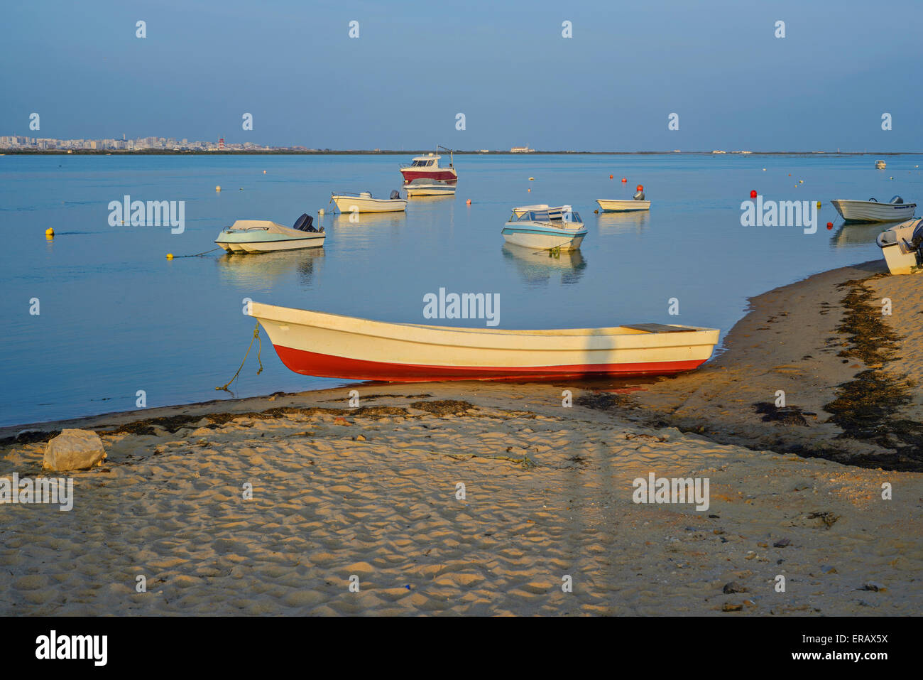 Photo of boats at sunset Stock Photo - Alamy