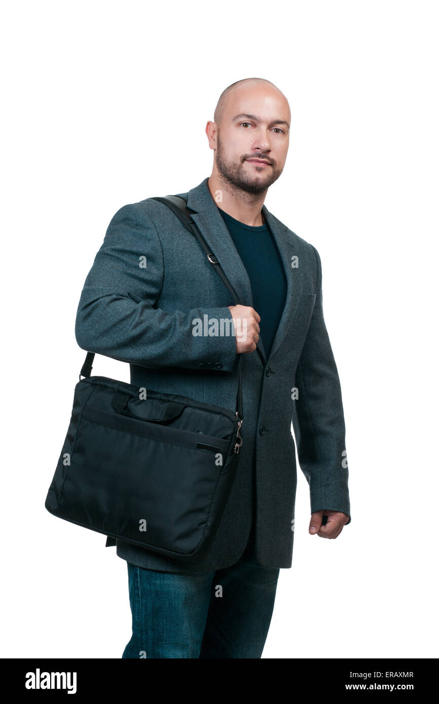 Portrait of young professional wearing stylish clothes, holding laptop computer bag Stock Photo