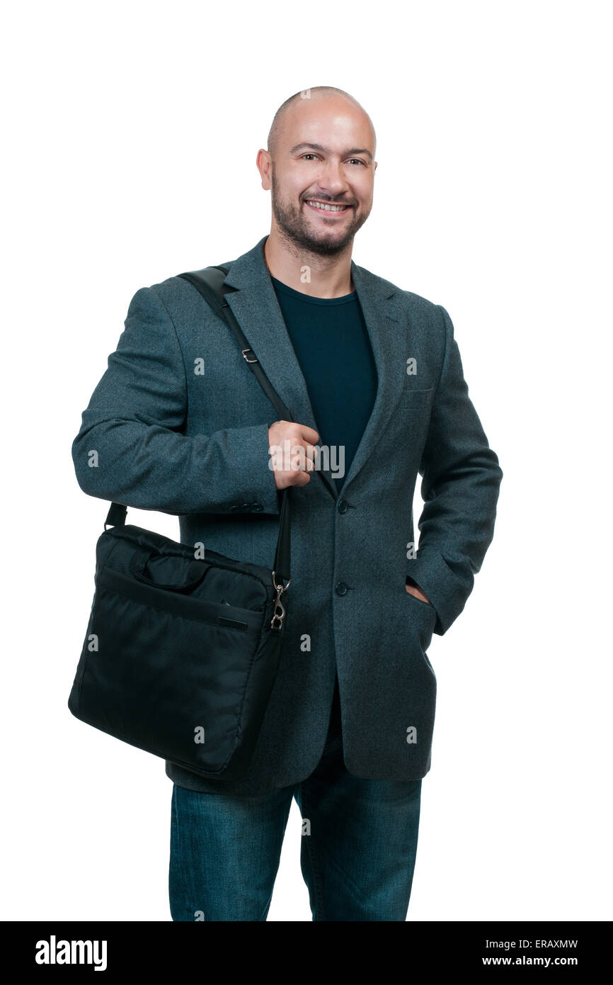 Portrait of young professional wearing stylish clothes, holding laptop computer bag Stock Photo