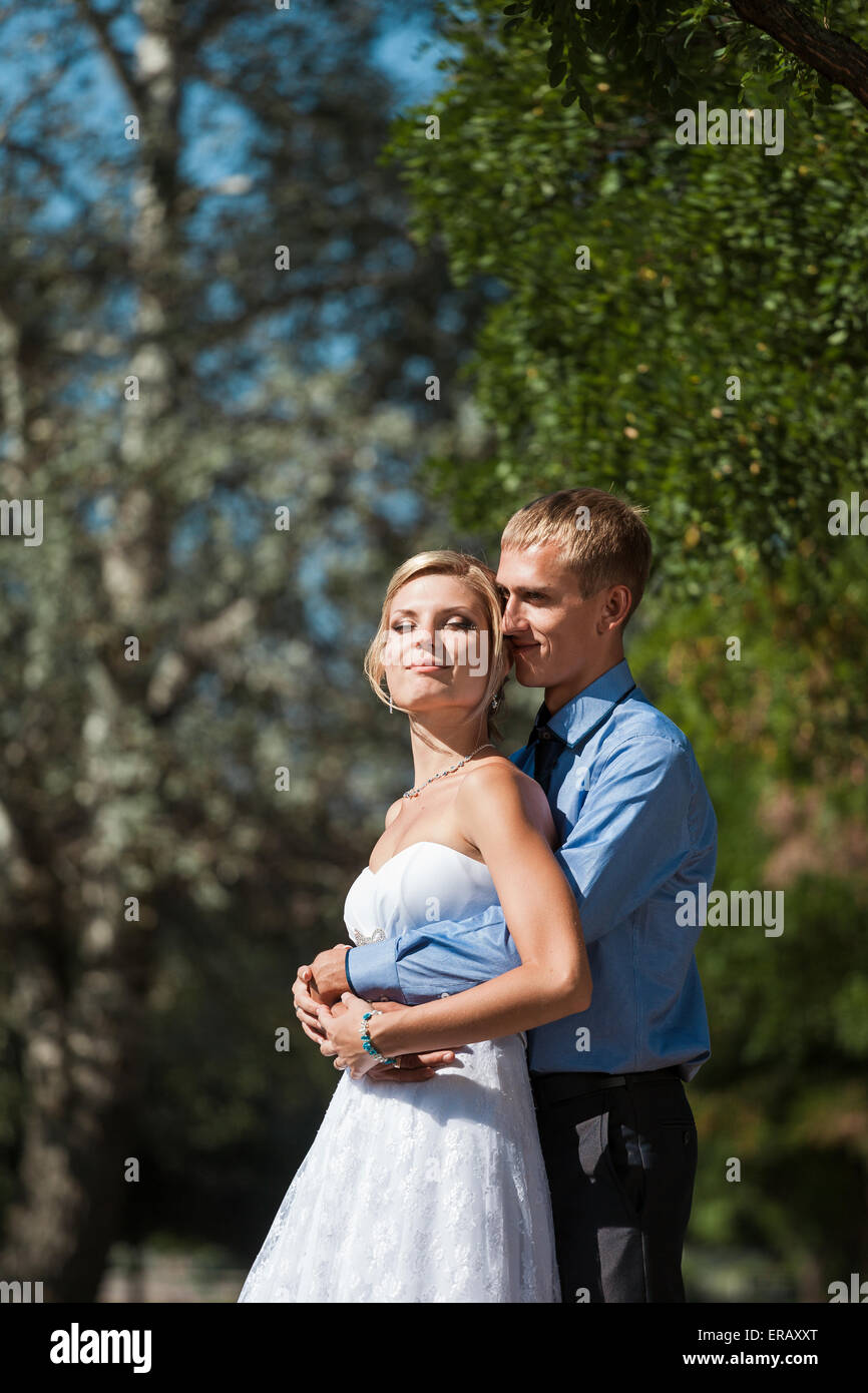 Happy bride and groom on their wedding day Stock Photo - Alamy