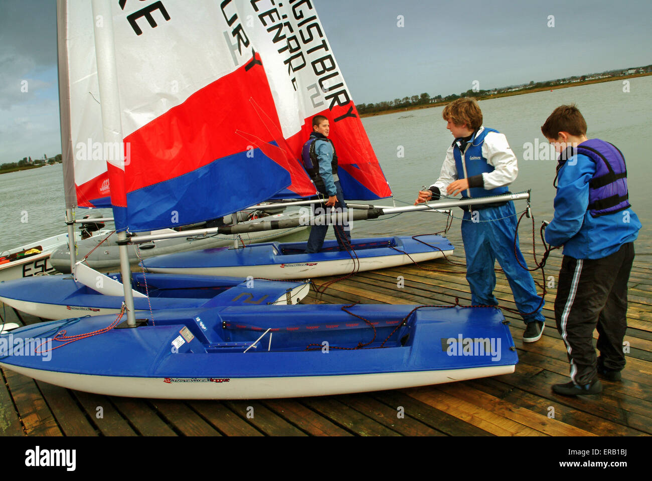 Youngsters sailing Topper dinghies at Hengistbury Head Centre, Dorset