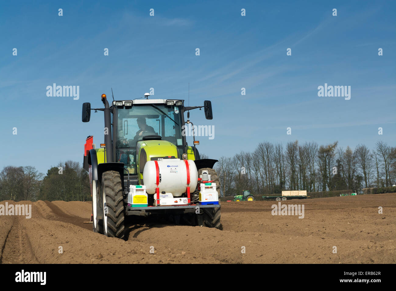 Tractor and potato planting machine hires stock photography and images Alamy