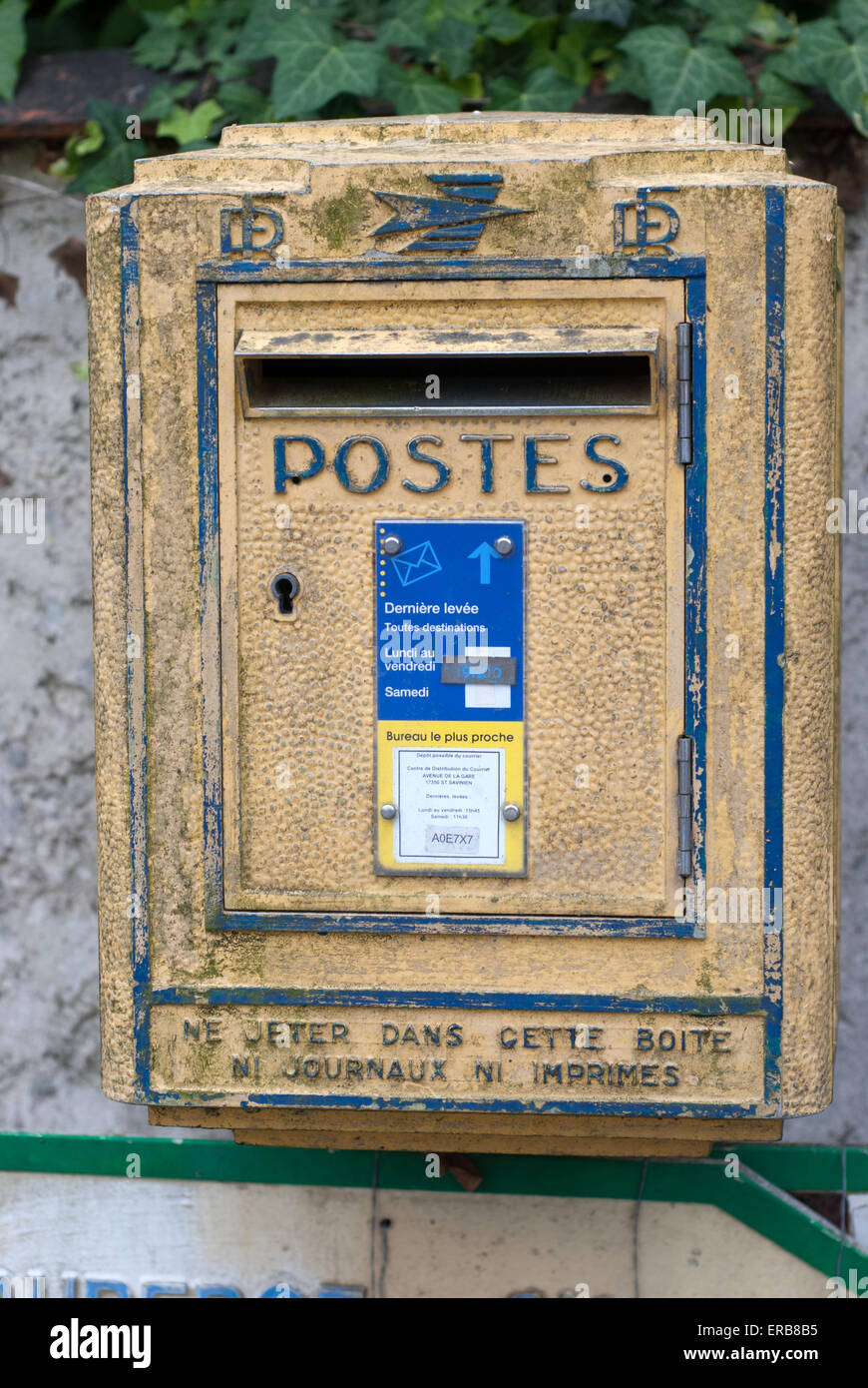 Typical french traditional post box Stock Photo