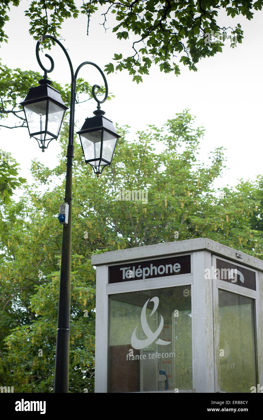 Public telephone box in Taillebourg, CharenteMaritime, France Stock