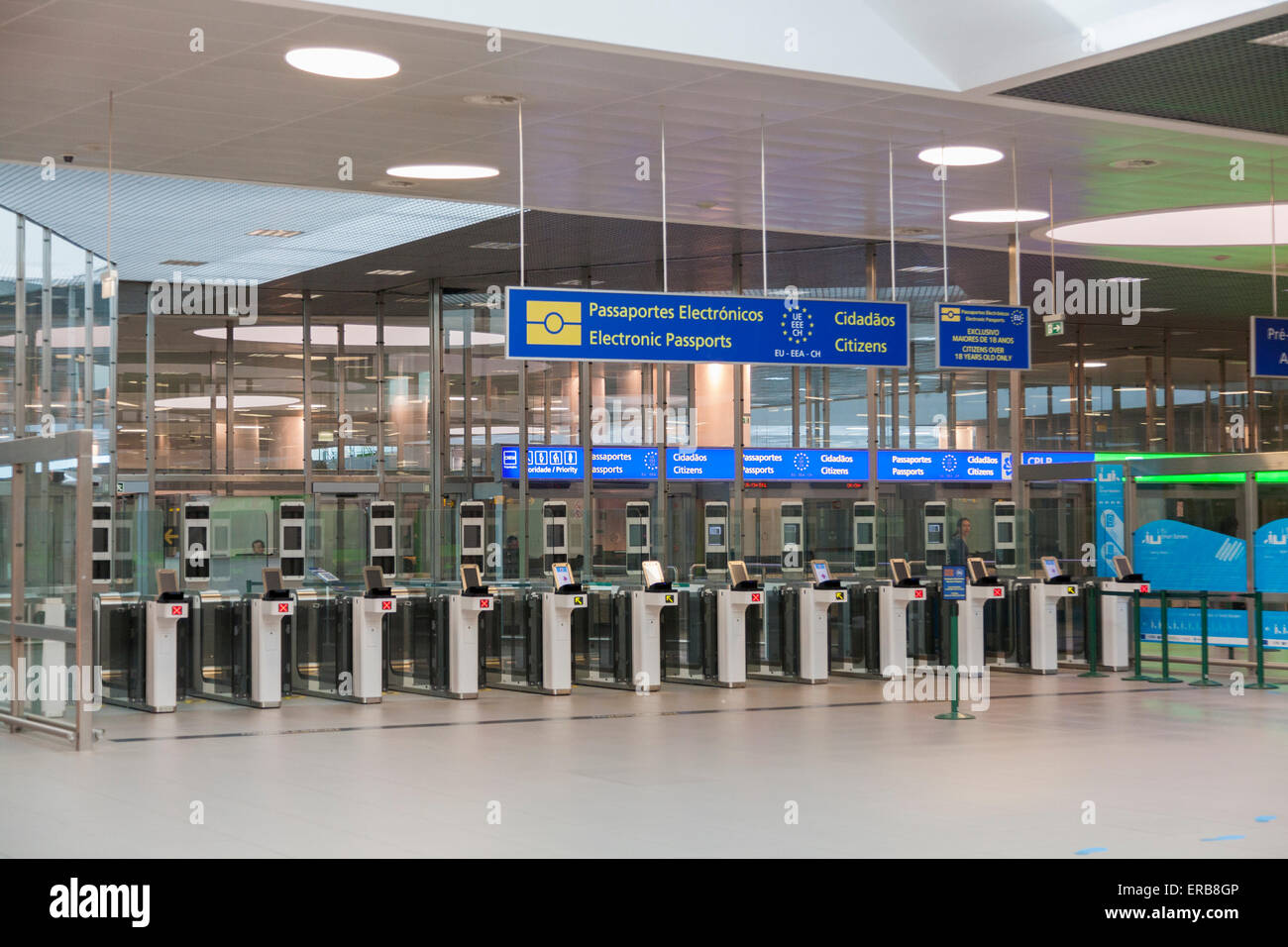 Passenger electronic passport control check gates: desks for checking departure / EU passengers leaving Lisbon Portela Airport. Stock Photo