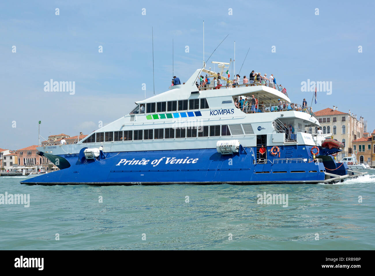 Sightseeing tourist passengers on catamaran "Prince of Venice" for Kompas  excursion on Giudecca Canal & Venice waterways in Venetian Lagoon Italy  Stock Photo - Alamy