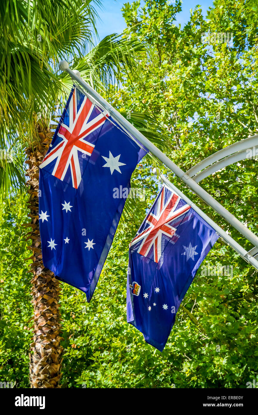 Close up view of two Australian flags hanging outside Department of Justice,  Government buildings in Melbourne, Australia Stock Photo