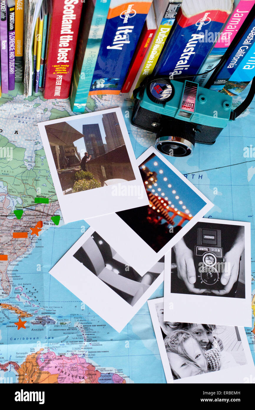 Travel image, including photographs, camera, travel guides and map. Stock Photo
