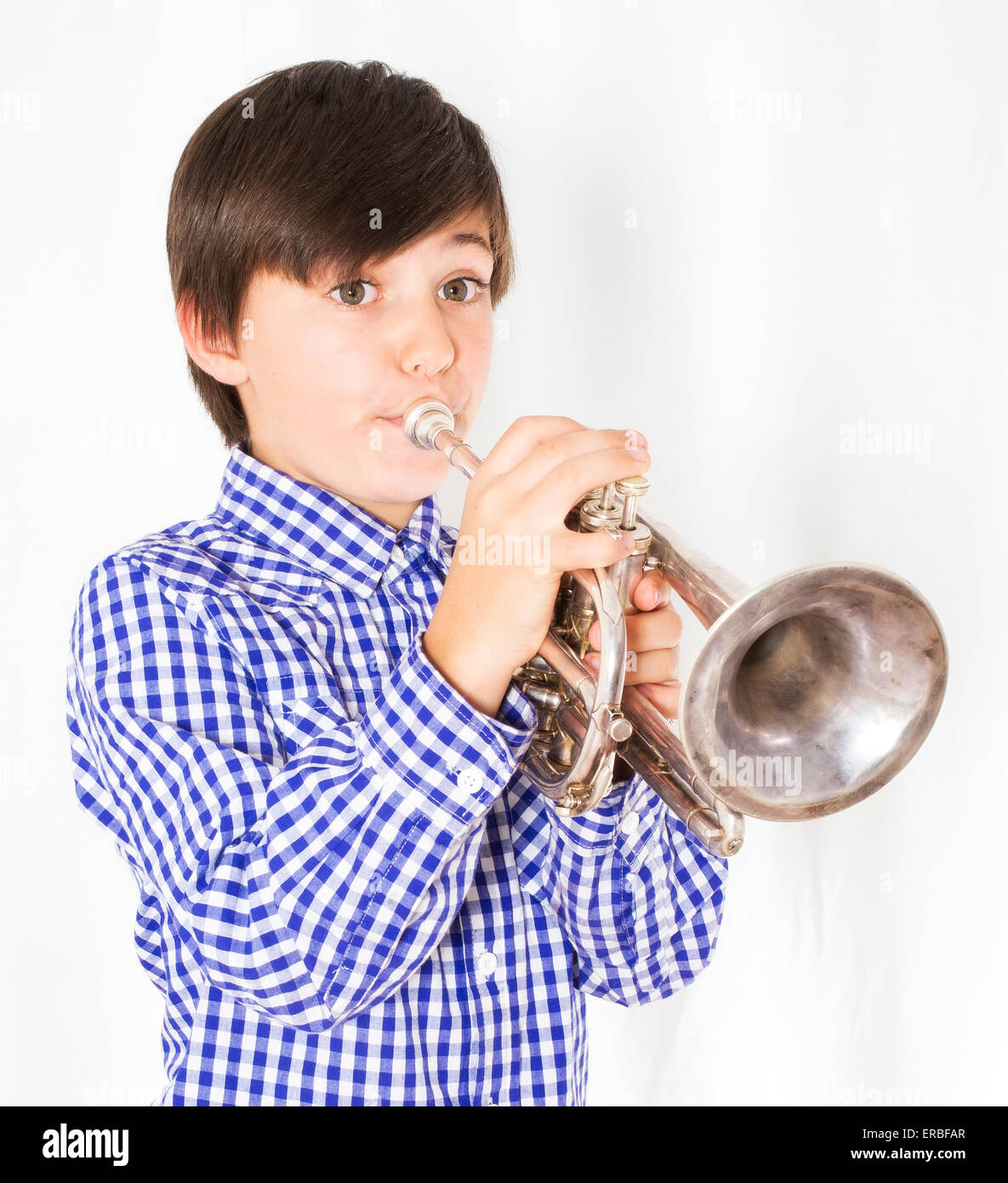 portrait of a boy playing the trumpet Stock Photo Alamy