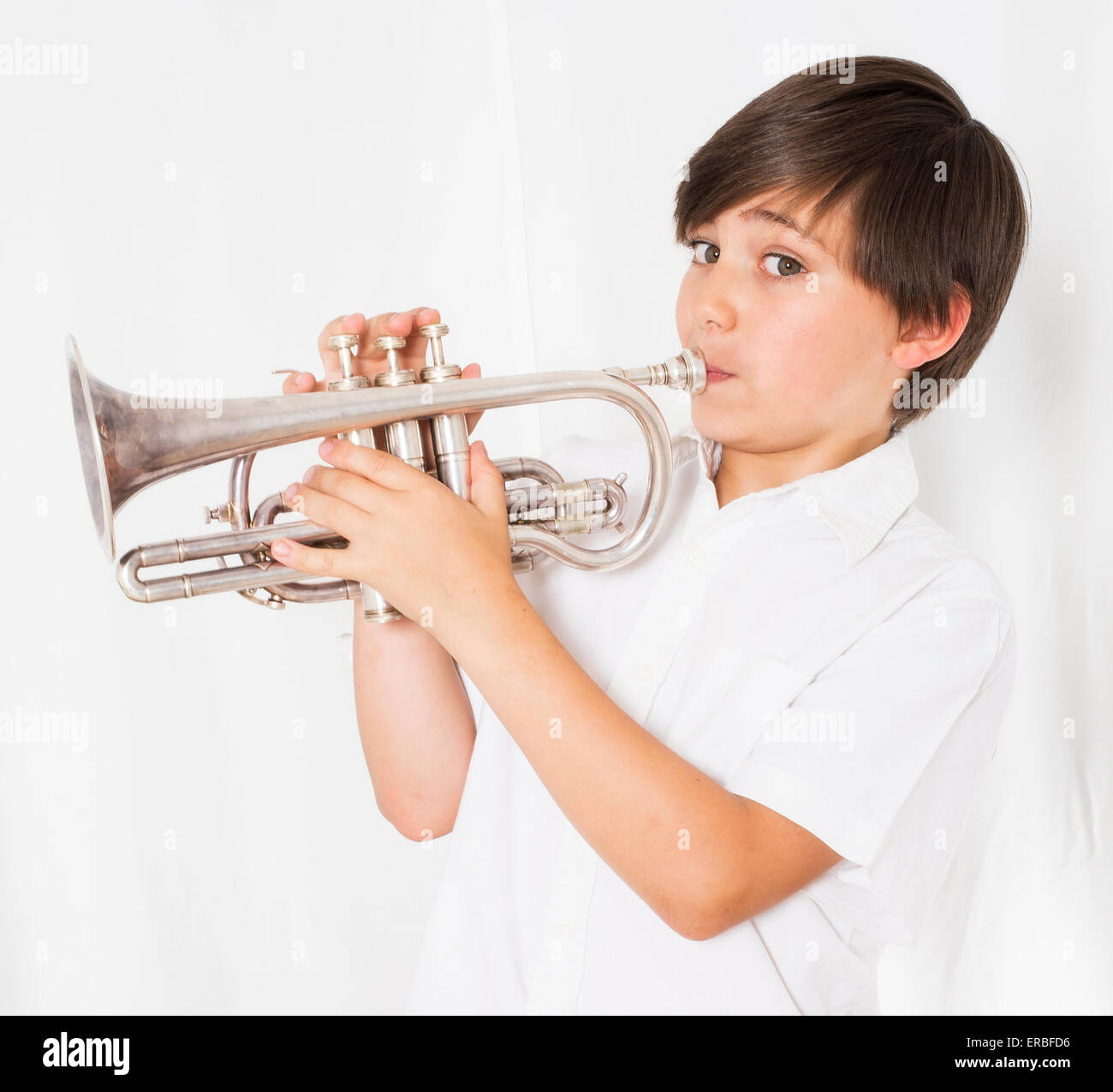 Talented boy playing the trumpet hi-res stock photography and images - Alamy