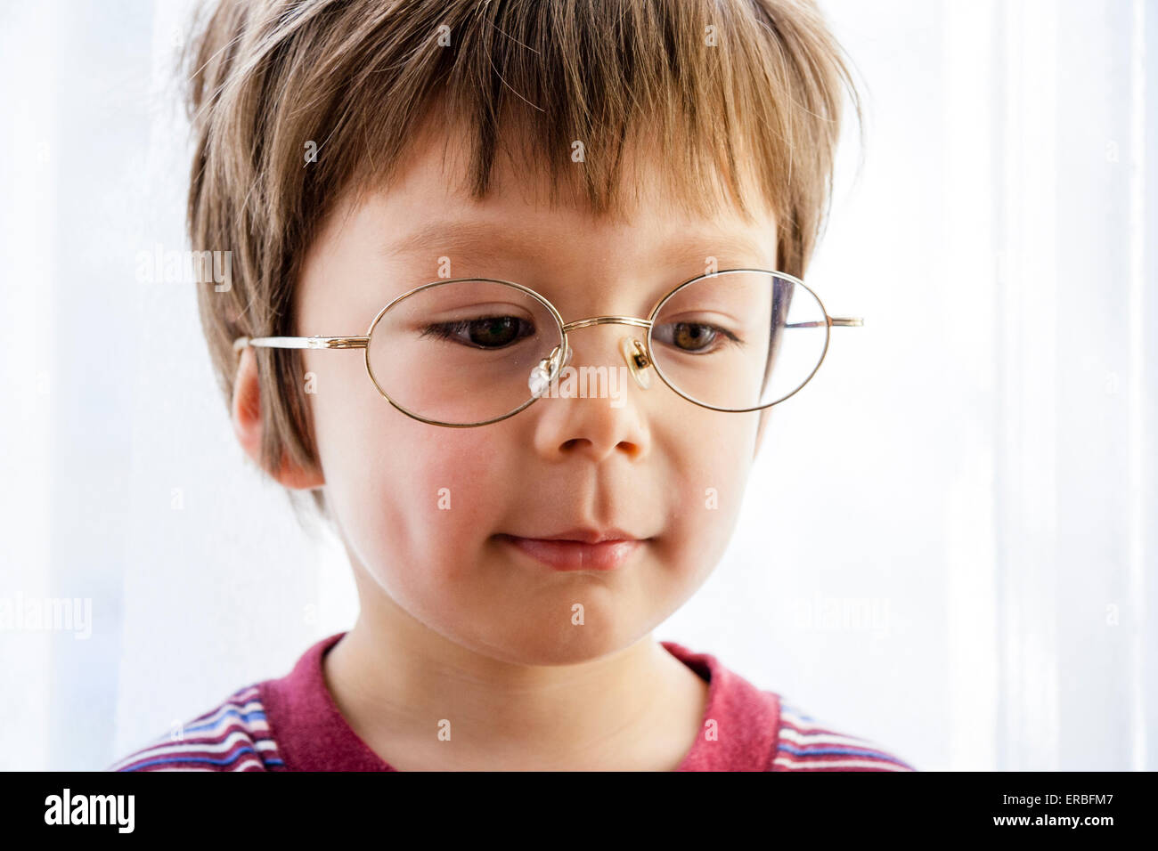 Face shot, close up of cute young child, boy with brown hair 4-5 year ...