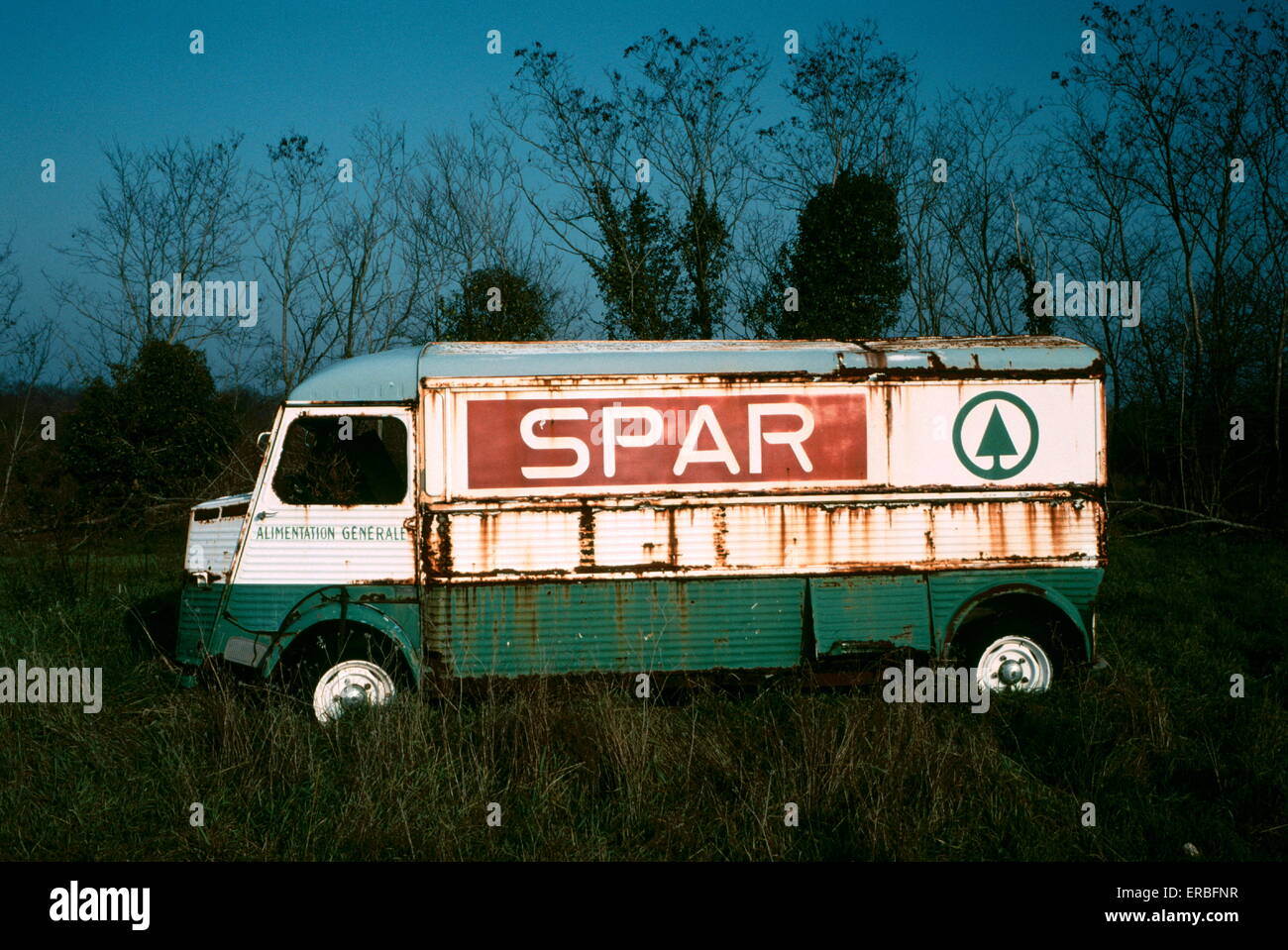 AJAXNETPHOTO - 1992. SOUTH WEST, FRANCE - FRENCH CAMIONETTE - CITROEN H VAN ADVERTISING SUPERMARKET BRAND ABANDONED IN COUNTRYSIDE. PHOTO:JONATHAN EASTLAND/AJAX. REF:920095 14 Stock Photo