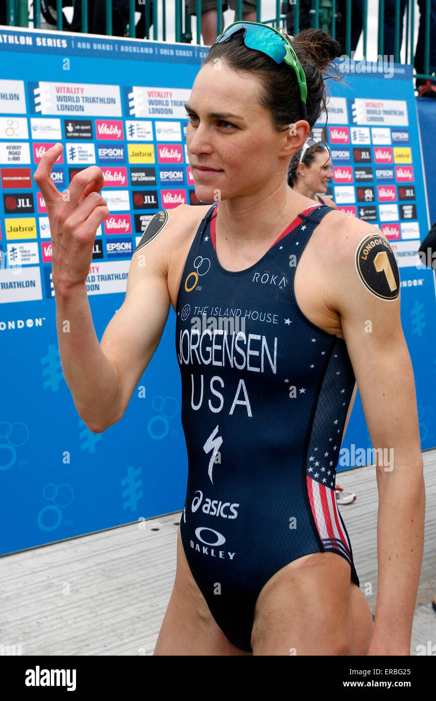 London, UK. 31st May, 2015. Gwen  Jorgensen (USA) calls over her significant other after recieving gold during Vitality World Triathlon London-Elite Women at Hyde Par Credit: © Dan Cooke/Alamy Live News  Stock Photo